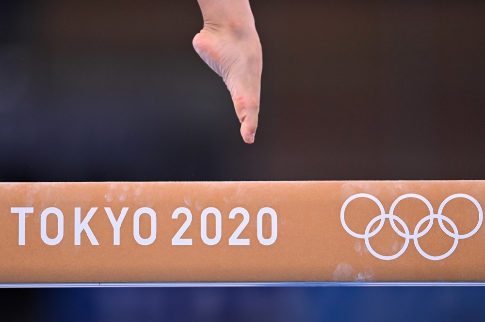 背負染疫風險的東京奧運即將開幕，從盼望帶來新希望的東奧，變成史上第一沒有觀眾的奧運，估計損失至少200億美元。（湯森路透）