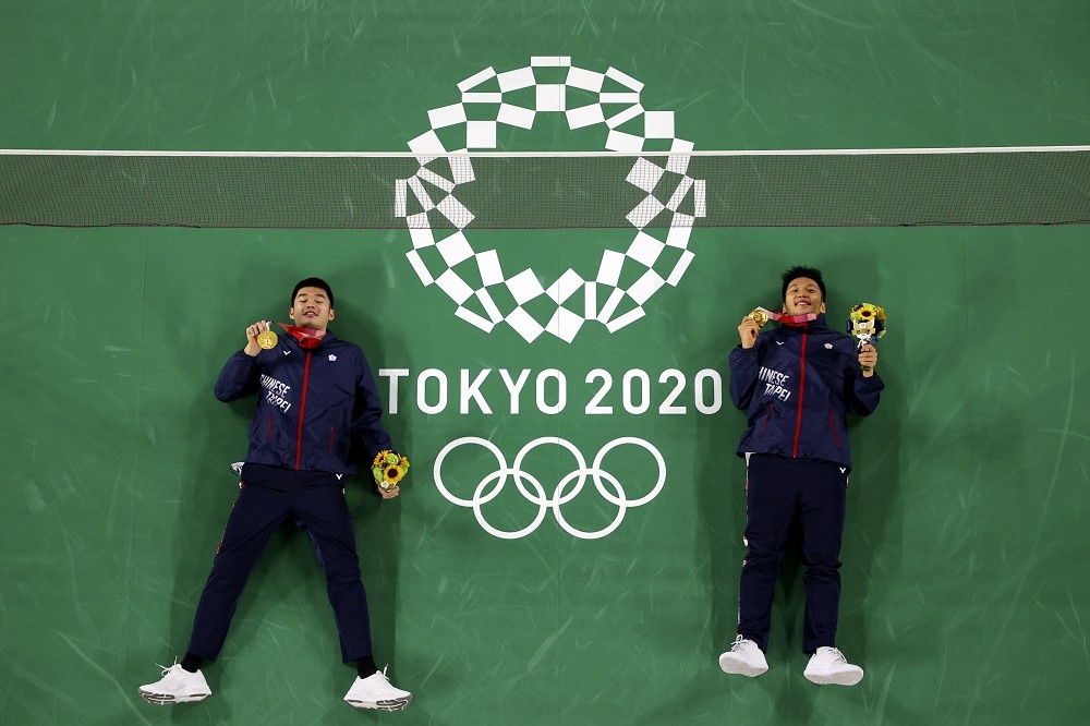 東京奧運羽球賽男子雙打王齊麟／李洋31日為中華隊再添一面金牌。（湯森路透）