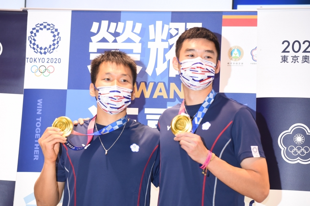 王齊麟（右）、李洋在本屆東京奧運羽球男子雙打奪得金牌。（資料照片／張哲偉攝）
