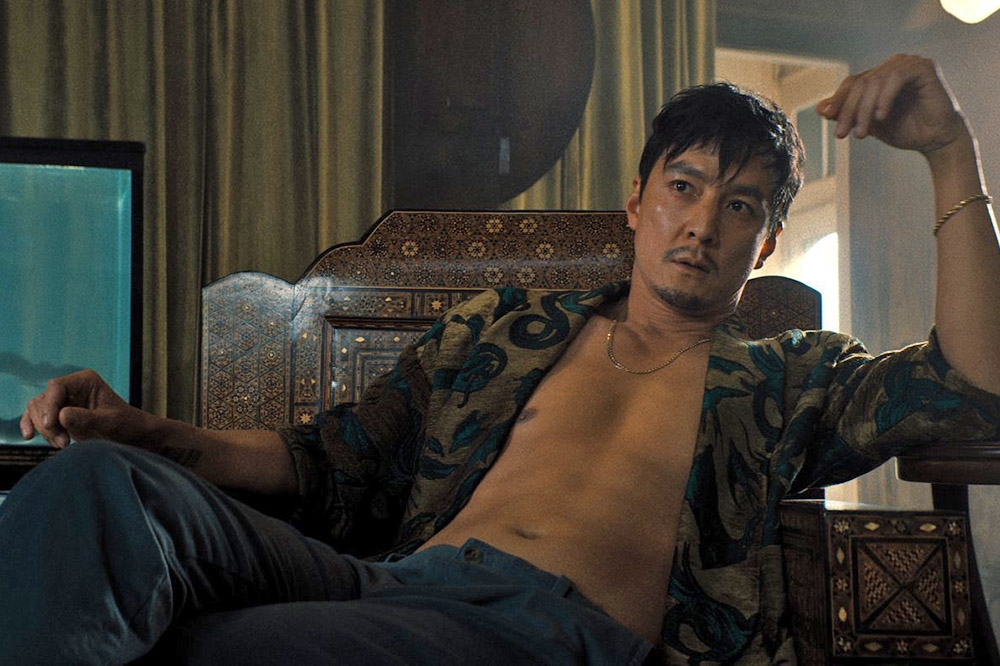 吳彥祖在《追憶人》扮演毒梟，內心傷痕累累，對外心狠手辣，個性鮮明。（華納兄弟提供）