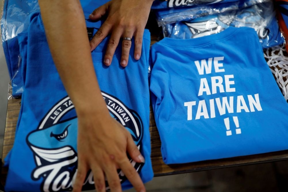2018年發起的東奧正名運動，曾被指會影響台灣選手參賽權利。（湯森路透）