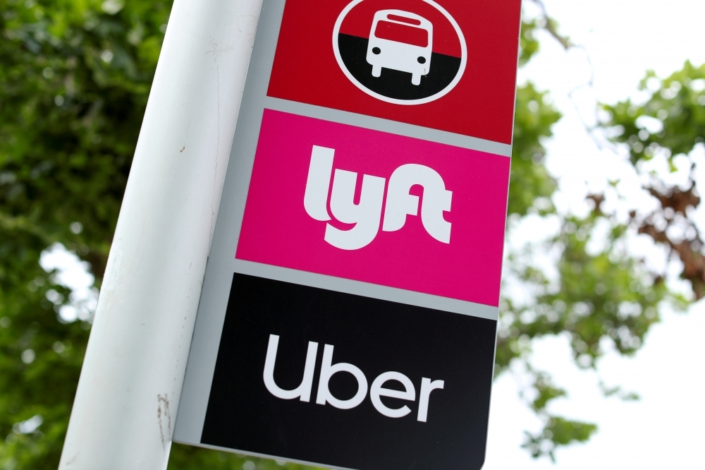美国共乘平台「Uber」及「Lyft」。（汤森路透）(photo:UpMedia)