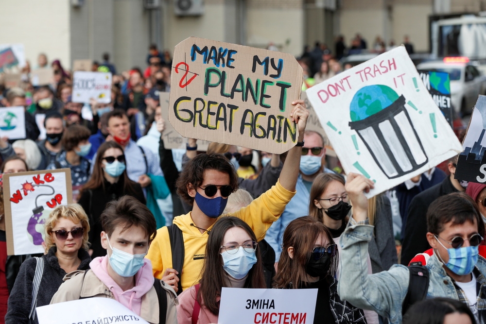 面对暖化和气候变迁，欧洲、澳洲等多地掀起示威活动，唿吁政府重视环境议题。（汤森路透）(photo:UpMedia)