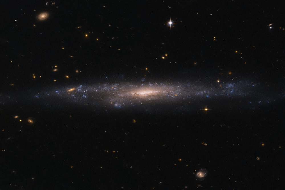 位於雙魚座、距離地球1.1億光年的UGC 477 星系。（NASA）