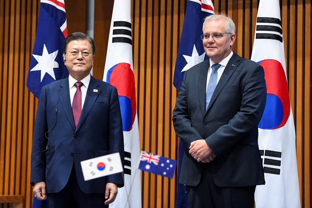南韓總統文在寅（左）和澳洲總理莫里森（右）。（湯森路透）