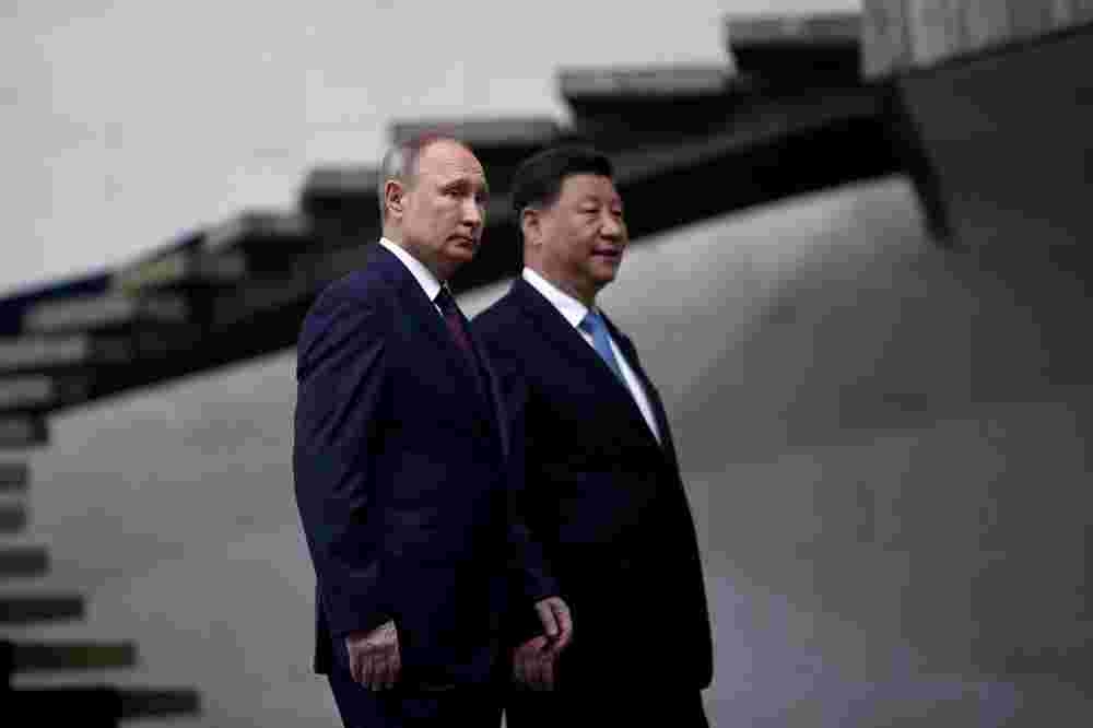 俄羅斯總統普京（左）與中國國家主席習近平（右）。（湯森路透）