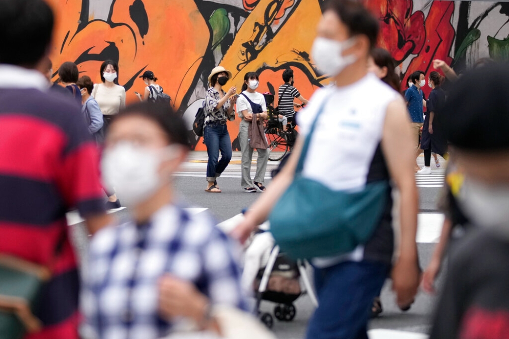 日本新冠病例居高不下，18日通報新增25萬5534人感染新冠肺炎（美聯社）