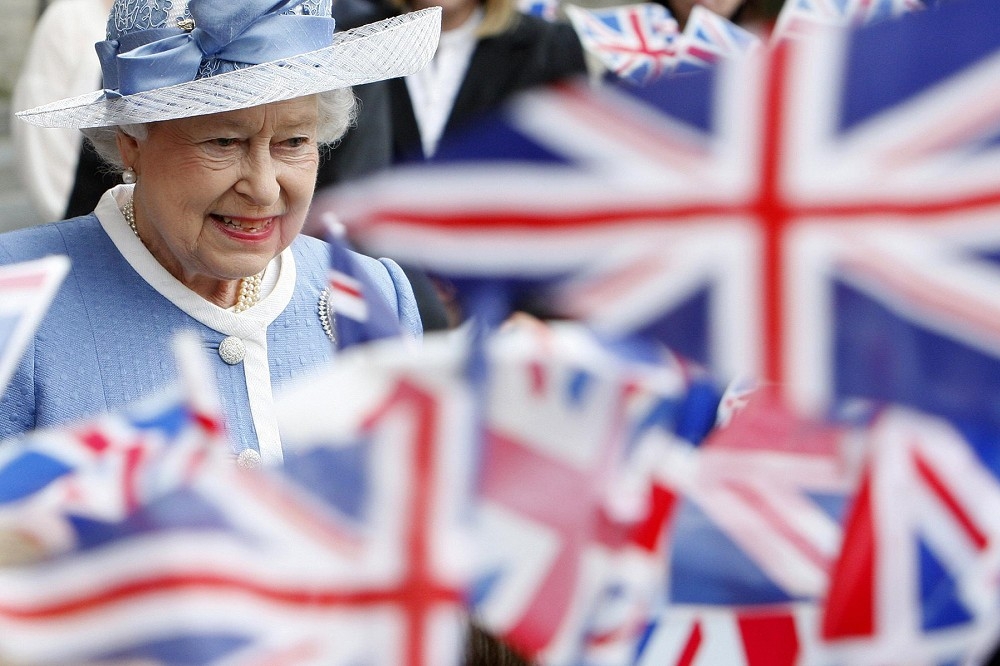 與其說美國人對英國王室有好感，或者精確地講，正是愛屋（英國女王）及烏所致。（美聯社）