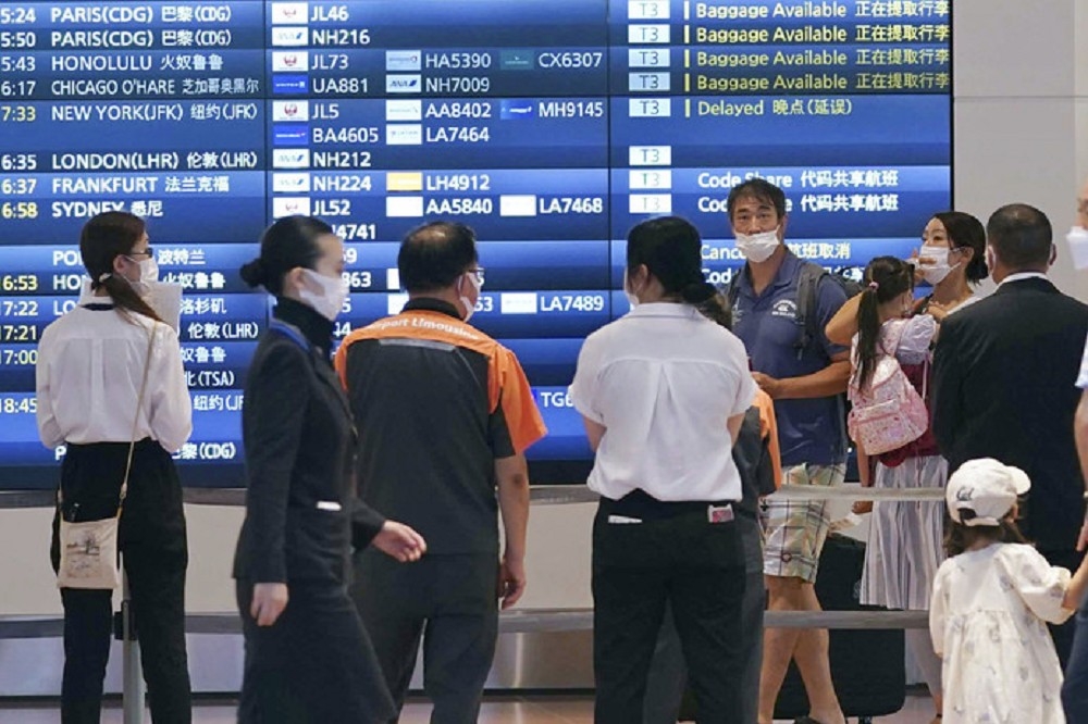 新冠疫情重重打击日本观光相关行业，图为东京羽田机场。（美联社）(photo:UpMedia)