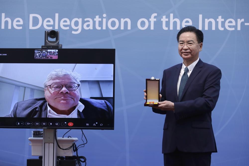 僅僅數年，歐洲議會對中關係代表團主席包瑞翰（左）對台灣和中國的看法就出現了天壤之別。（資料照片／美聯社）