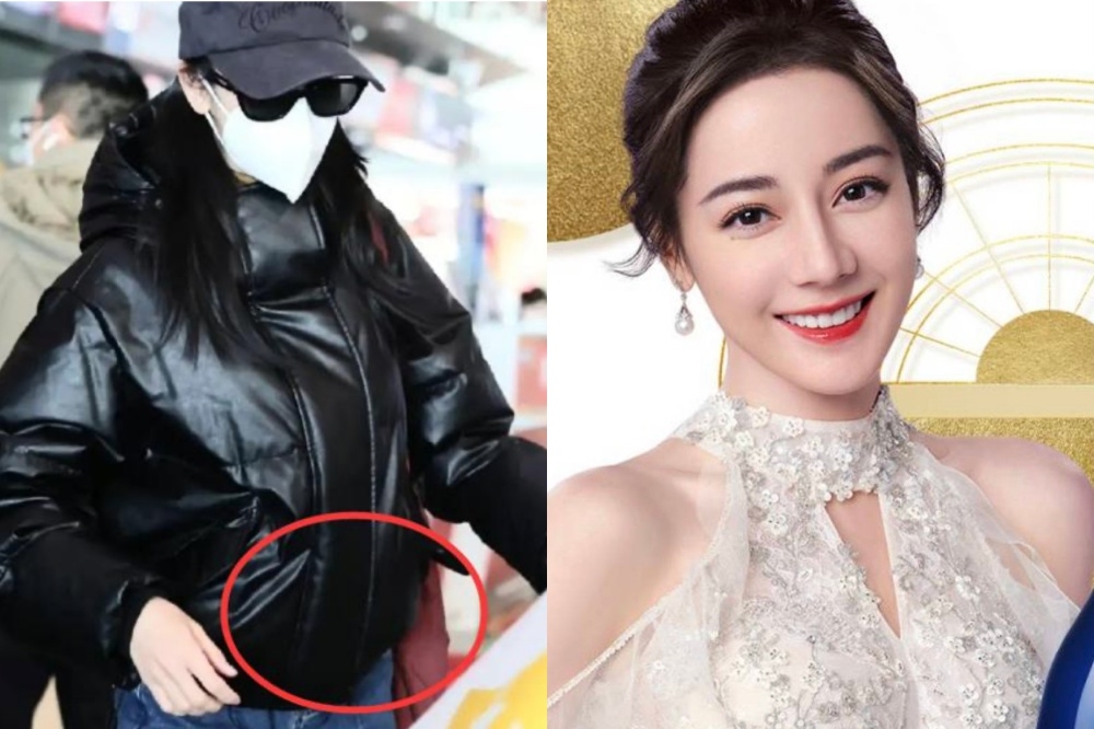 中国流量女星迪丽热巴最近爆出怀孕传闻，她近日现身机场，宽大的外套仍遮不住鼓起的小腹。（取自微博）(photo:UpMedia)