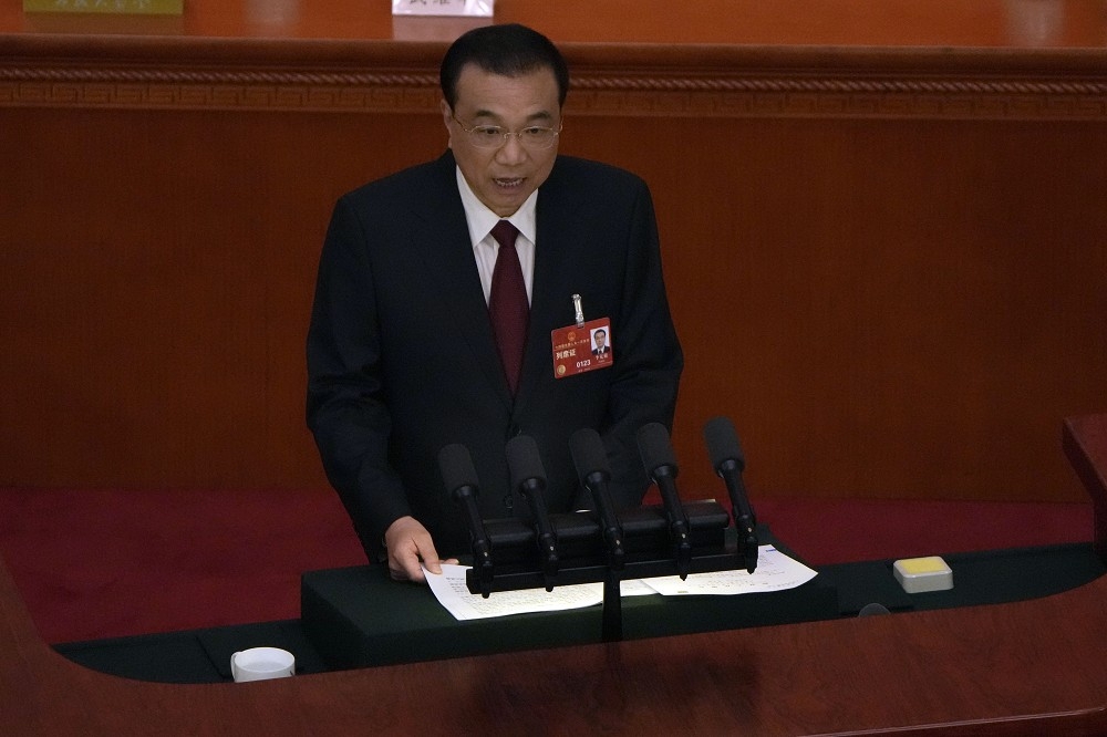 中國第十四屆全國人大5日開幕，國務院總理李克強進行政府工作報告。（美聯社）