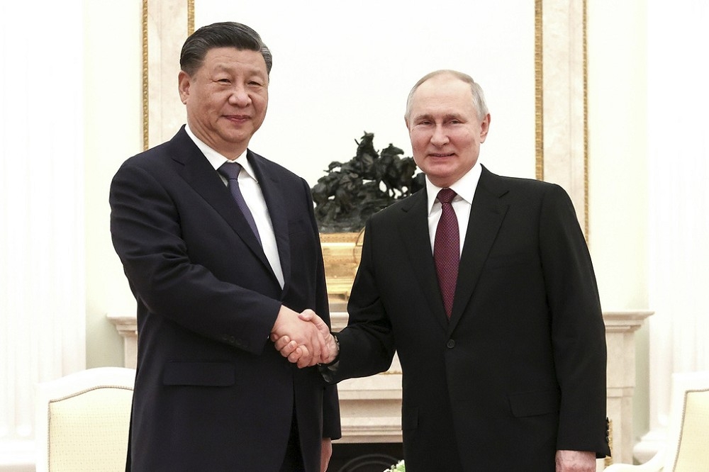 中國領導人習近平與俄國總統普丁，在20日首日進行非正式會談，正式會談於今日登場。（美聯社）