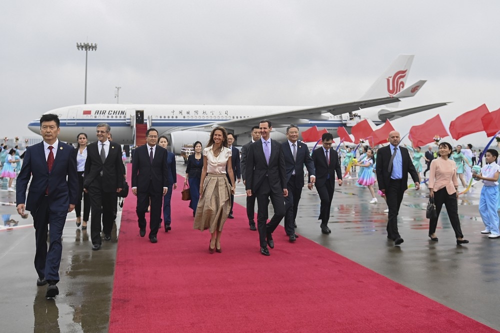 叙利亚总统阿塞德伉俪一行人，21日飞抵杭州，准备出席亚运开幕仪式，并将和习近平会面。（美联社）(photo:UpMedia)