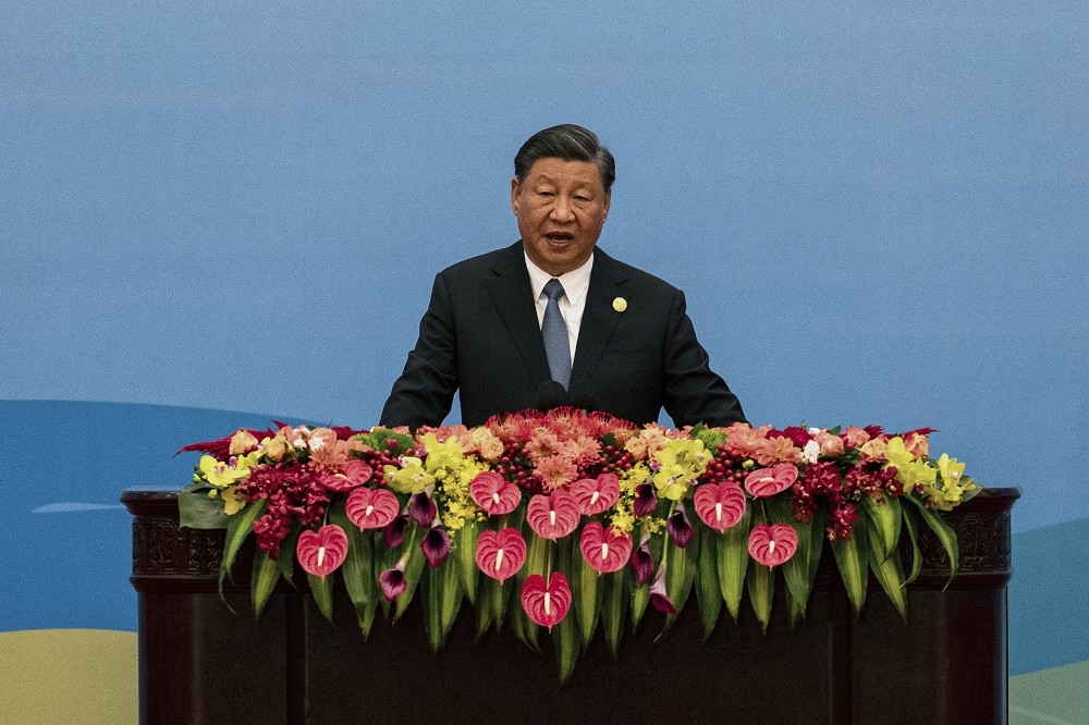 習近平18日在一帶一路峰會上宣示中國對外開放的立場。（美聯社）