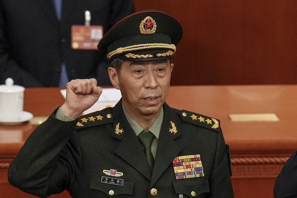 李尚福就任中國國防部長只有7個多月。圖為今年3月12日，甫當選為國防部長的李尚福在人民大會堂宣示。（資料照片／美聯社）