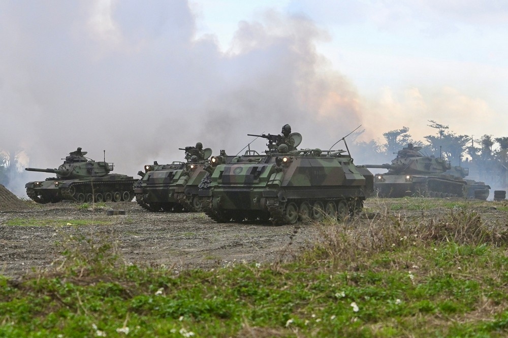 陸軍台東地區指揮部下午進行「反滲透、反特攻」操演，圖為CM21甲車與M60A3戰車。（張哲偉攝）